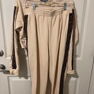 I’m selling a lounge/pj set! Only worn once! Top and bottom both large!